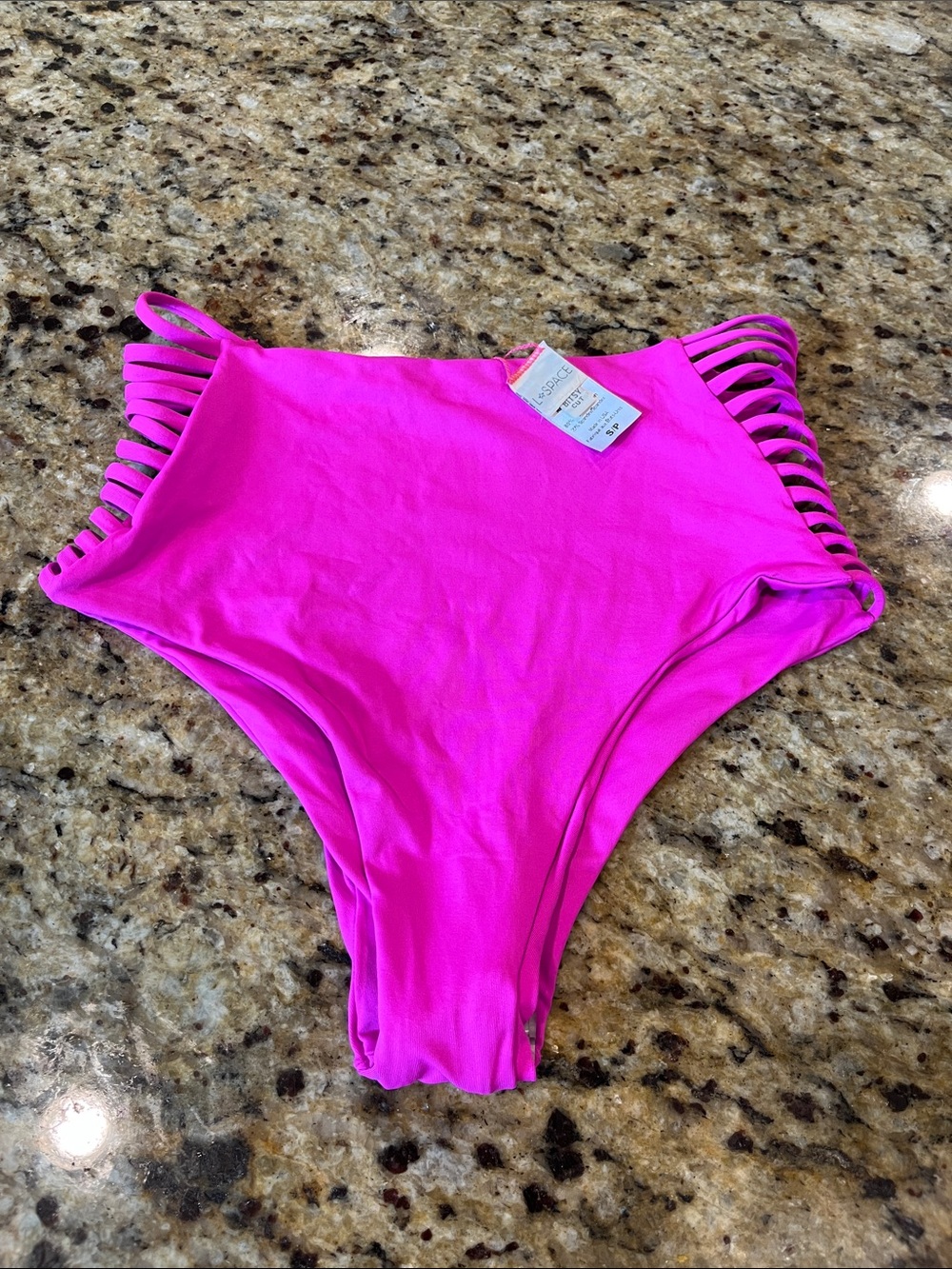 L*Space Harrington bikini bottoms with strappy side detail. Brand new. Sz small